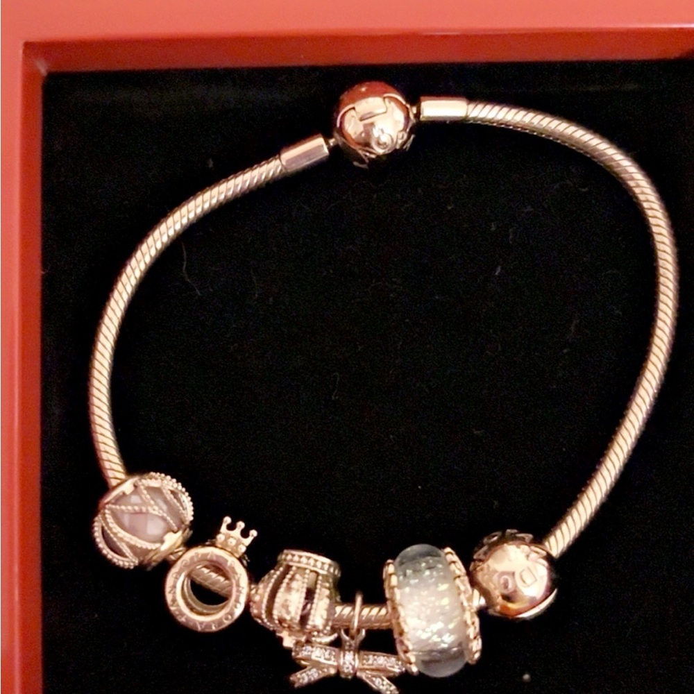 Elegant rose gold plated authentic Pandora bracelet with  charms !